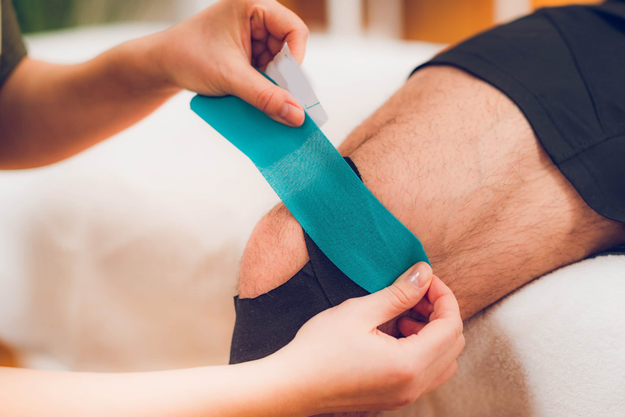 Knee treatment with kinesio tape